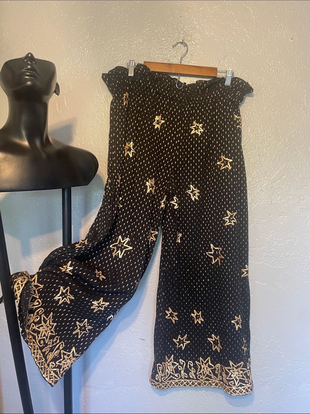 Black Wide-Leg Star Print Pants with Gold Motif
